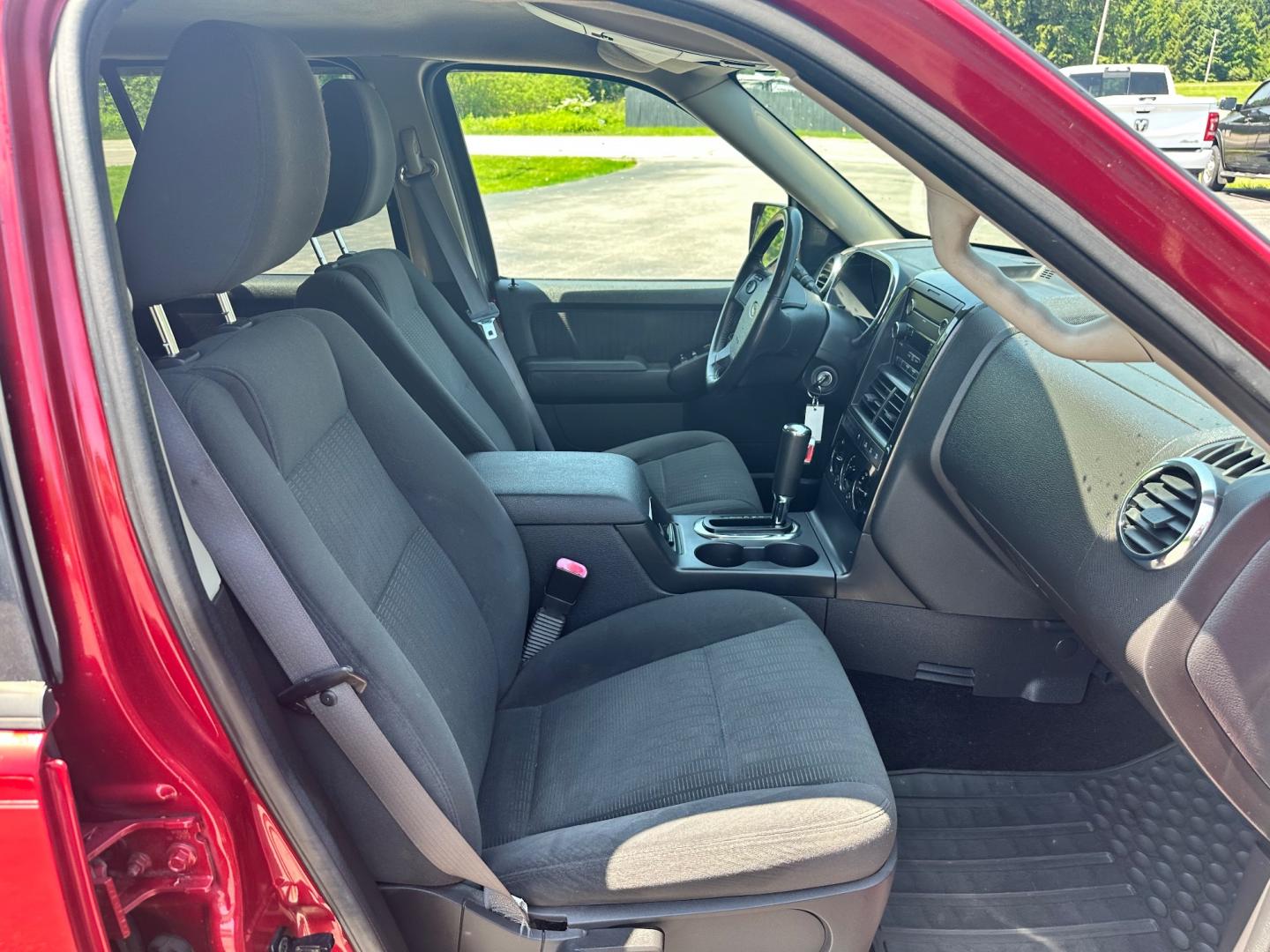 2009 Red /black Ford Explorer XLT (1FMEU73E89U) with an 4.0L V6 engine, 5-Speed Automatic transmission, located at 11115 Chardon Rd. , Chardon, OH, 44024, (440) 214-9705, 41.580246, -81.241943 - This 2009 Ford Explorer is a reliable and capable SUV, offering a 4.0L V6 engine paired with a 5-speed automatic transmission and full-time 4WD system. With a 3,500-pound towing capacity, it's suitable for moderate hauling needs. Additionally, the power driver's seat provides comfort and convenience - Photo#40